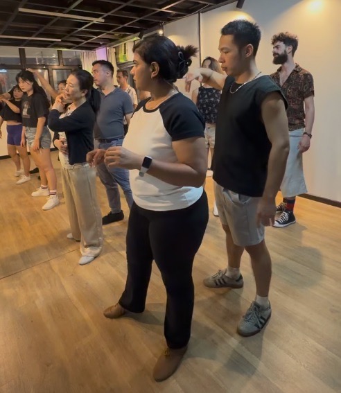 Students practising the basics together in a Zouk Haus Fundamentals class